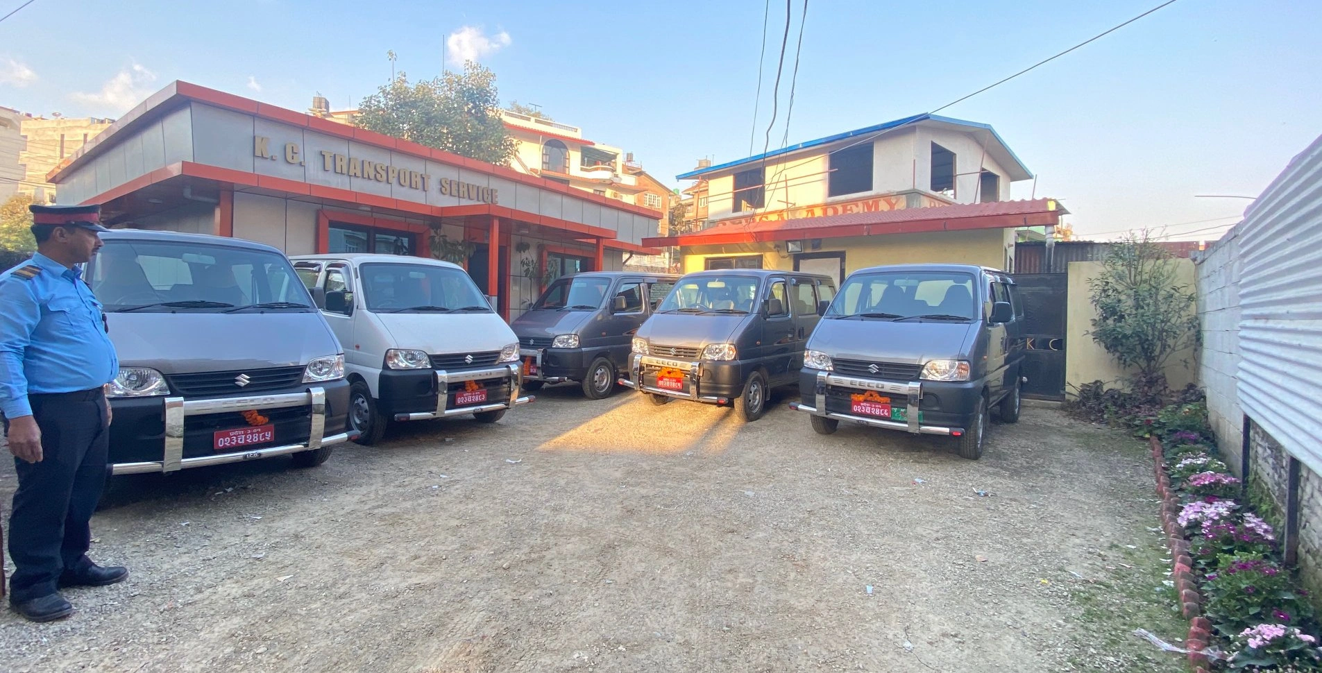 Woman in business attire by car